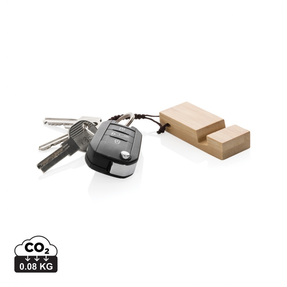 Logotrade Firmengeschenke das Foto: Standkey Bambus Schlüsselanhänger Telefonständer