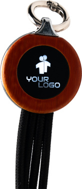 Logotrade Firmengeschenke das Foto: 4-in-1-Kabel mit elighted-Logo im Holzgehäuse