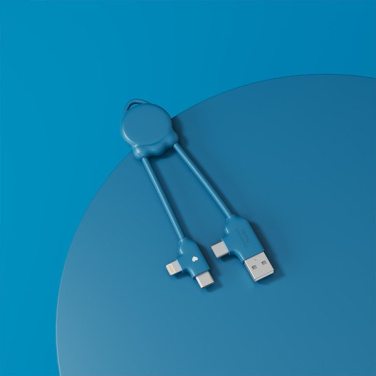 Blaues Xoopar Octomini Ladekabel auf blauem Hintergrund
