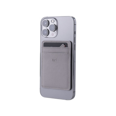 Taupe Xoopar INÉ Mini card holder on the back of a dark grey phone