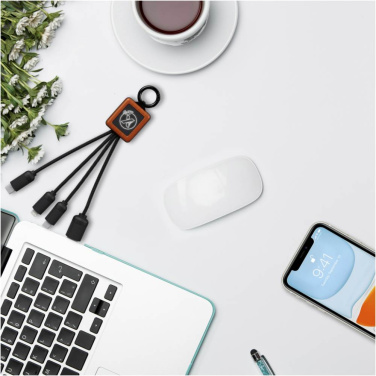 SCX.design C19 20 W puidust 3-in-1 laadimiskaabel helendava logoga – kasutuses