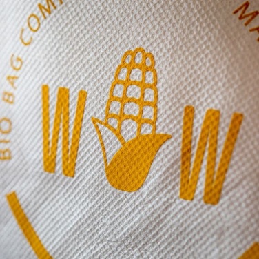 Logo trade mainoslahja kuva: Maissitärkkelyksestä tehdyt jalkinepussi, valkoinen