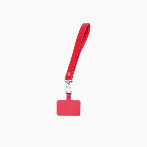 Dragonne de téléphone Xoopar INÉ Wrist rouge avec mousqueton et languette de fixation.