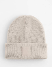 Mössa med djupa muddar och tonala lappar för barn